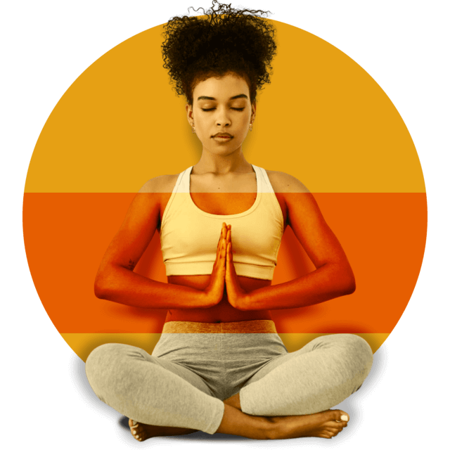 Woman in a yoga pose sitting with her legs crossed and eyes closed