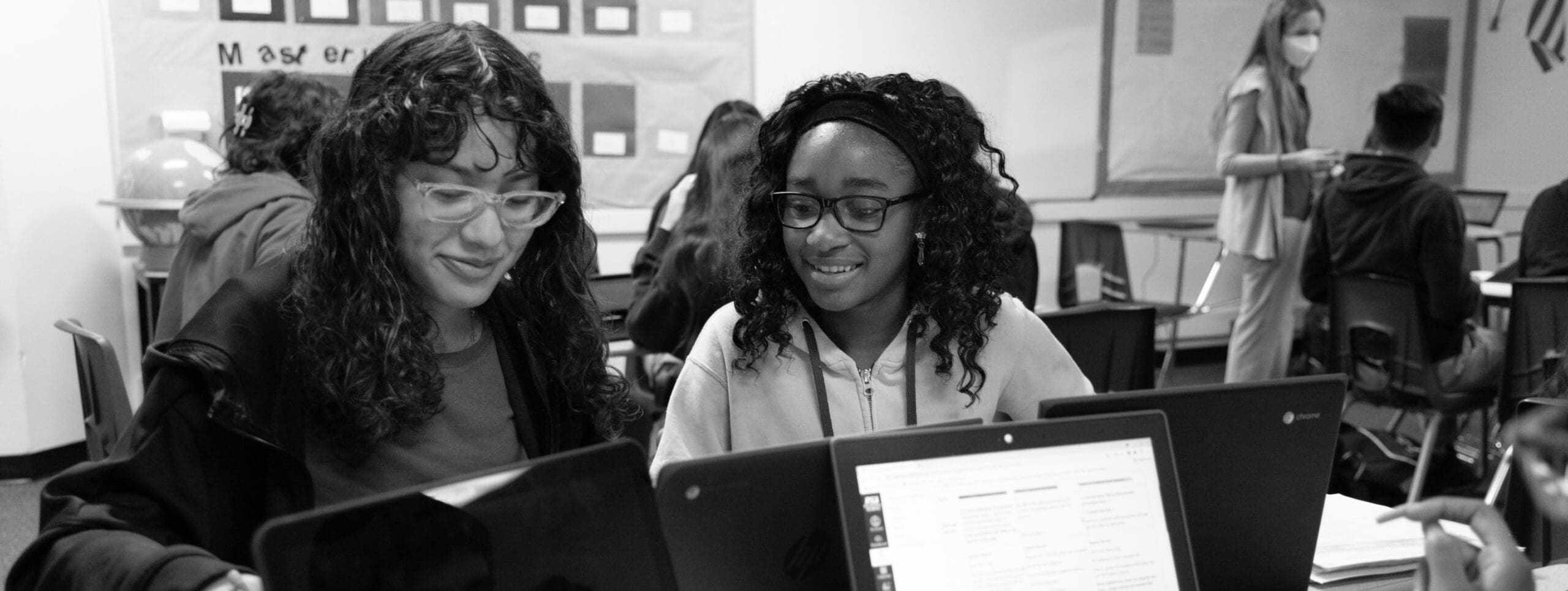 Students in a classroom with laptops