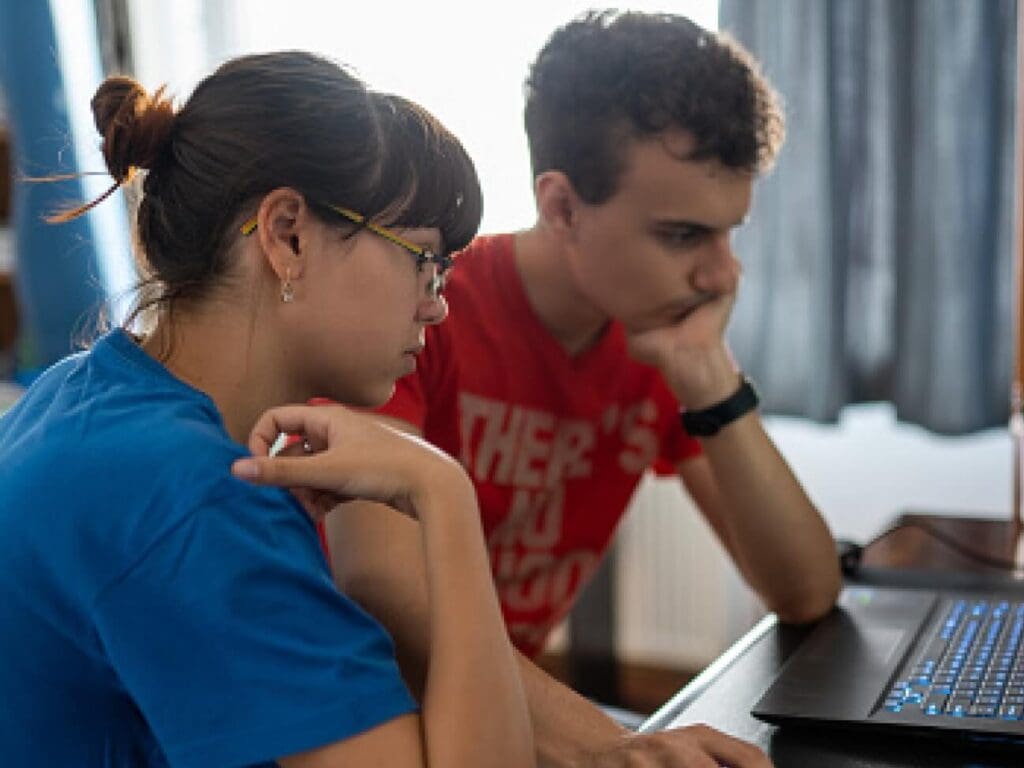 Student and parent working from home