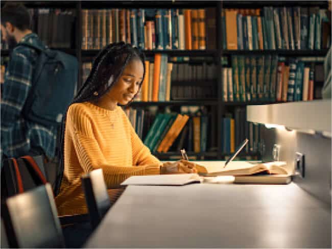 Student working in a library