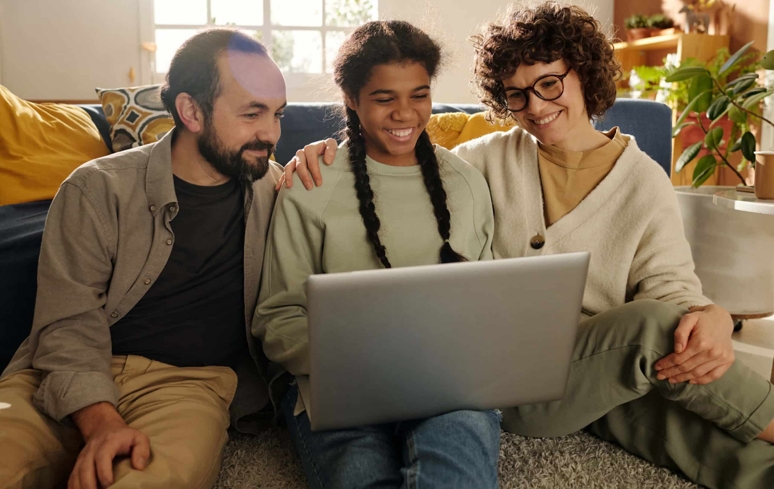 Student and parents learning virtually