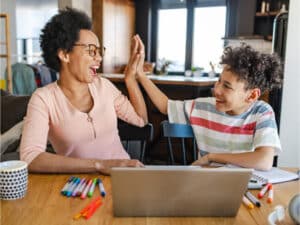 Student and parent learning virtually