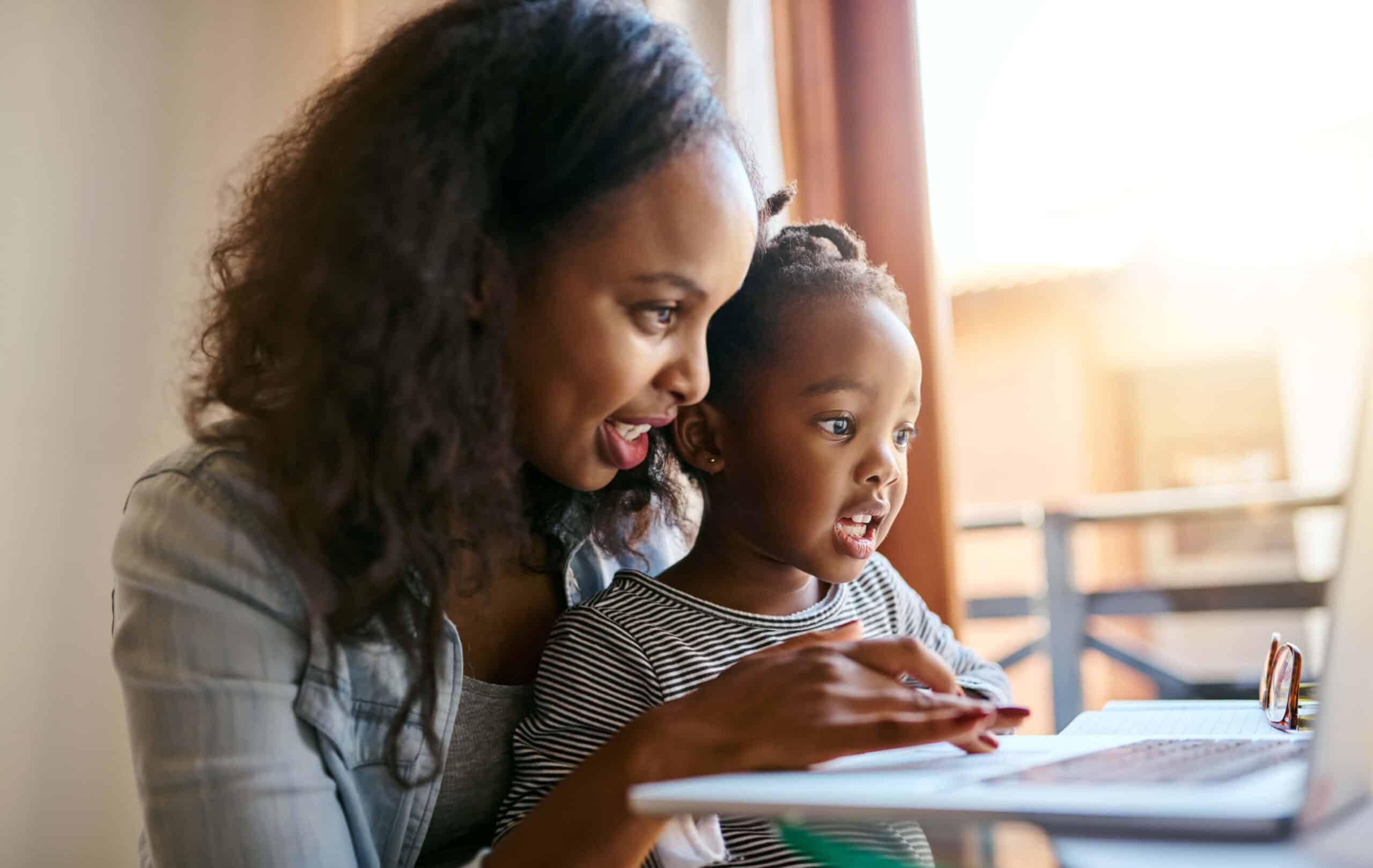 Student and parent learning virtually