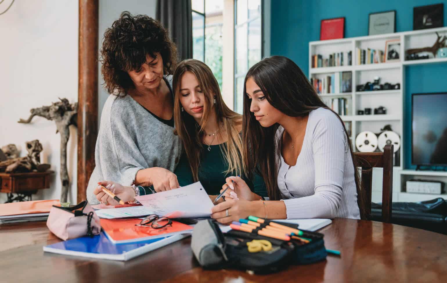 Family helping student with college interviews