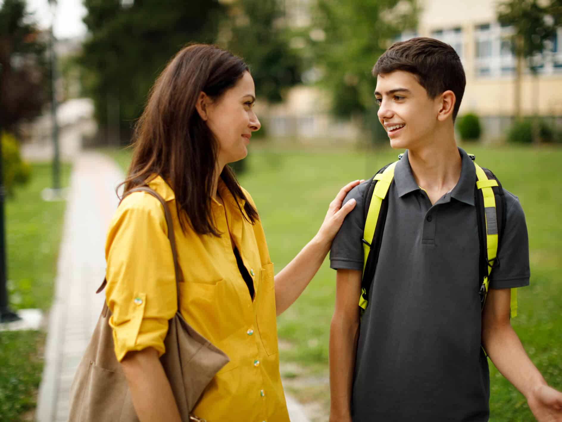 Student and parent walking