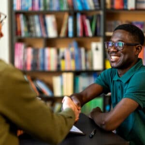 Student and college faculty in an interview